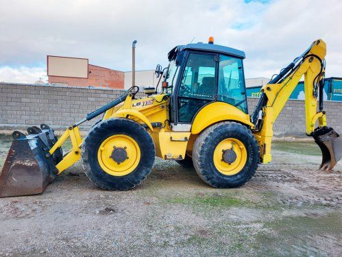 New Holland LB115 usada en venta